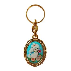 Llavero Ornamento Dorado Perro Blanco